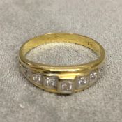 18ct gold and diamond set ring, illusion set line of 7 single cut diamonds, 3.4g, size P