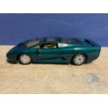 Unboxed toy model of a Jaguar XJ 220, Scale 1/12