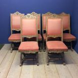 Set of 6 decorative carved French style chairs with X stretcher and pink upholstery to seats and