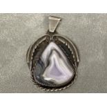 A Sterling silver and agate pendent, marked TH