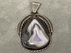 A Sterling silver and agate pendent, marked TH