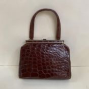 A tan crocodile Ladies Vintage handbag