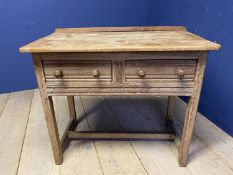 Small pine effect side table, with 2 drawers to front, and central stretcher to base 91cmL x 49cm