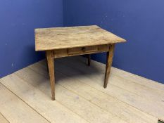 Small pine table, with tapered legs, some wear, and open joints/cracks to surface