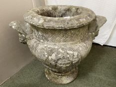 Large weathered stone urn