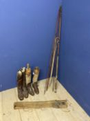 Quantity of vintage wooden boot trees, boots, riding boots, 2 camel sticks, and vintage fishing rods