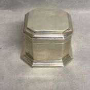 A Scottish sterling silver octagonal lidded box on stepped octagonal foot, by Hamilton and Inches,