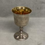 A Sterling silver goblet on circular stepped foot with gilt interior by Mills and Hersey, London,