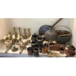 A quantity of brass and copper wares, to include light wall sconces, early candlesticks, jam pan,