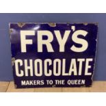 An enamel Frys Chocolate aadvertising sign on tin, some losses to sides and screw holes, 61 x 71cm