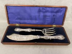 A boxed set of Victorian sterling silver fish servers by Aaron Hadfield, Sheffield, 1851, 288g