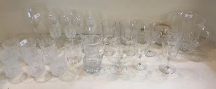 A quantity of 7 tumblers and jug, etched and engraved glassware (etched Edinburgh, Scotland to