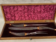 Steel and Antler handled carving set in a velvet lined oak box