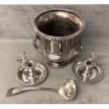 A silver plated campagna style champagne ice bucket, together with a pair of plated "go to beds"