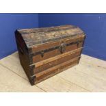 Domed top storage trunk with wooden slats and handles
