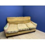 Upholstered 3 seater sofa, on mahogany legs to castors, in need of restoration and upholstery ,