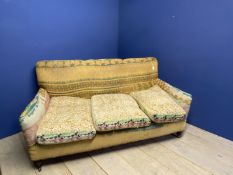 Upholstered 3 seater sofa, on mahogany legs to castors, in need of restoration and upholstery ,