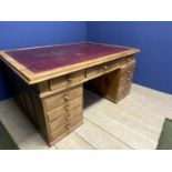 Large pine 12 drawer partners desk with red leather inset top, 171cm L x 120 W x 79cmH