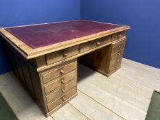 Large pine 12 drawer partners desk with red leather inset top, 171cm L x 120 W x 79cmH