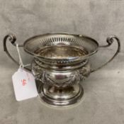 Sterling silver footed bowl with pierced rim, garlands and swags and loop handles by Aspreys and