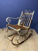 Decorative, white painted garden rocking chair, weathered
