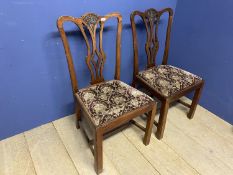 Pair of heavy mahogany dining chairs, with drop in seats