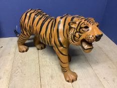 Painted model of a tiger, 54 cm High x overall length approx 107cm; Condition - some minor scuffs,
