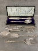 Three sets of C19th electro plated fish servers, one case, one pair with sterling handles