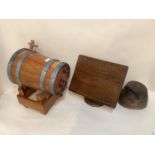 Vintage wooden and bound barrell , and an oak desk top lecturn, and a vintage wooden hat block