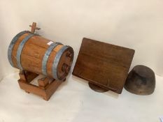 Vintage wooden and bound barrell , and an oak desk top lecturn, and a vintage wooden hat block