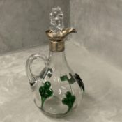 A Sterling silver topped claret jug with applied green glass decoration by Henry Wigfull Sheffield