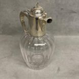 A sterling silver topped claret jug of bulbous reeded design and star base, by Alexander Clark &