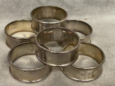 A set of 6 sterling silver napkin rings by Derby College of Arts, London, 1977, approx 320g