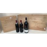 Two presentation boxes, Berry Bros & Rudd, and some bottles of wine