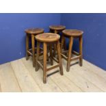 4 wooden stools, some wear