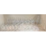 A quantity of modern glassware to include large red wine goblets, champagne flutes etc