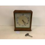 An oak framed mantle clock, Elliott, by Batty, Liverpool, with key