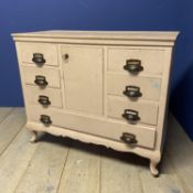 Pink painted chest of 3 short and 1 long drawer and central cupboard 103cm L, as found