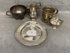 A collection of sterling silver items to include a presentation plate, christening mug , cream jug
