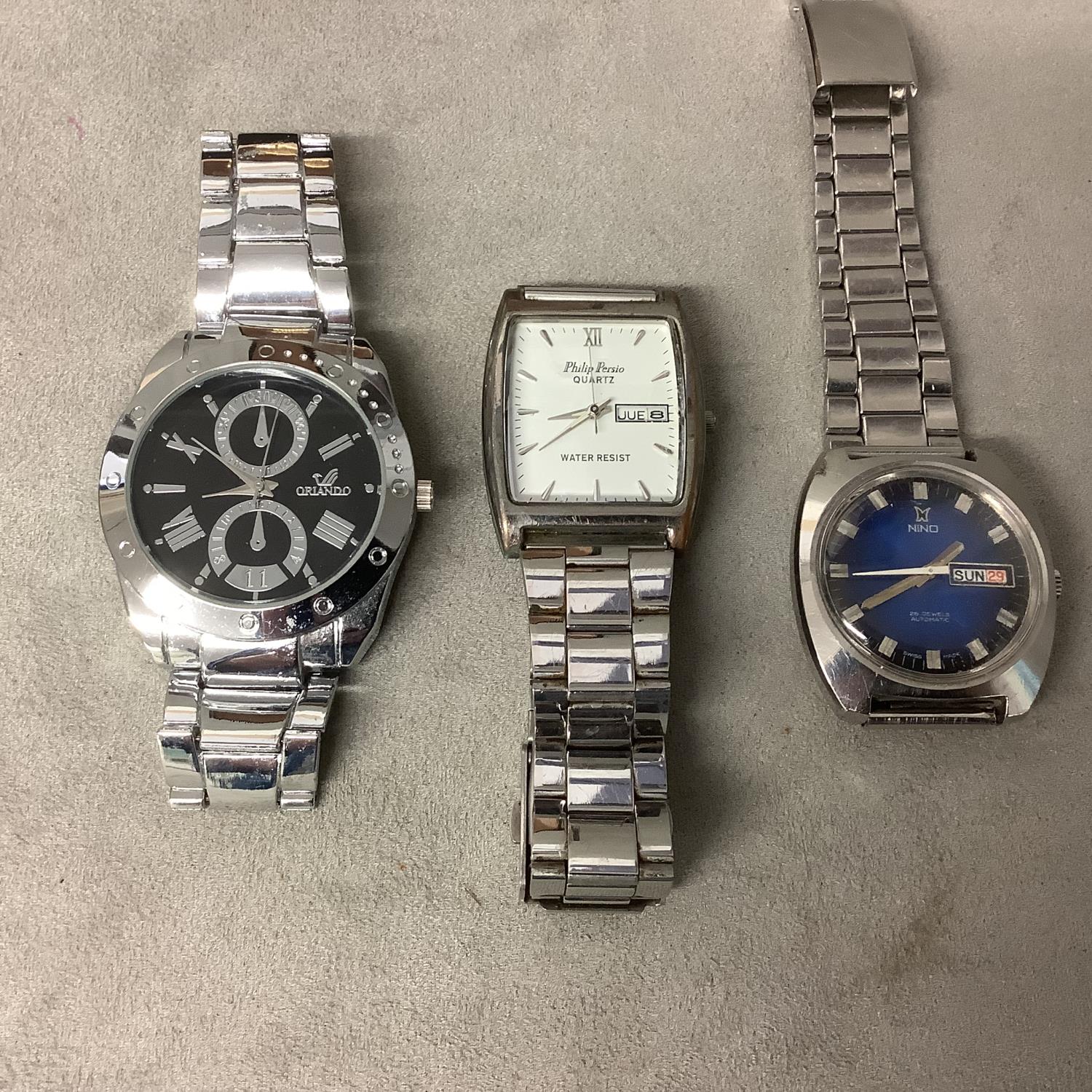 Four vintage gents wristwatches, to include a Nino 25 Jewel Automatic, blue face with Day/Date - Image 4 of 7
