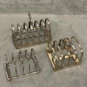 Three Sterling silver toast racks, two four division and one six division 310 gn, various makers and
