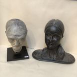 Two decorative busts on plynths