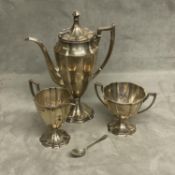 A sterling silver 3 piece coffee set in the Adams Style of heavy gauge by Cooper Brothers & Sons Ltd