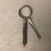 An unusual sterling silver combination propelling pencil and magnifying glass by William Edward