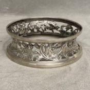 An Irish silver dish ring with pierced naturalistic design by James Wakely and Frank Clarke Wheeler,