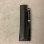 A Waterman Paris black and gilt metal fountain pen in original leather sleeve