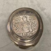 Britannia silver oval lidded box with chased armorial decoration possibly by Crichton Brothers, ear