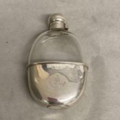 A sterling silver mounted hip flask by William Brothers, Birmingham 1910 (good condition)
