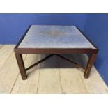 A square framed wooden stool