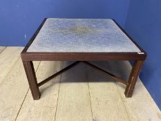 A square framed wooden stool